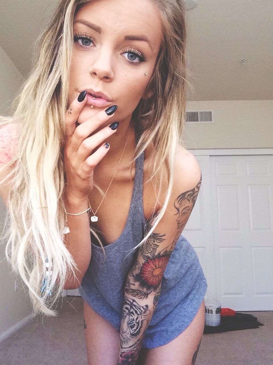 Super hot babe piercing and tattoo